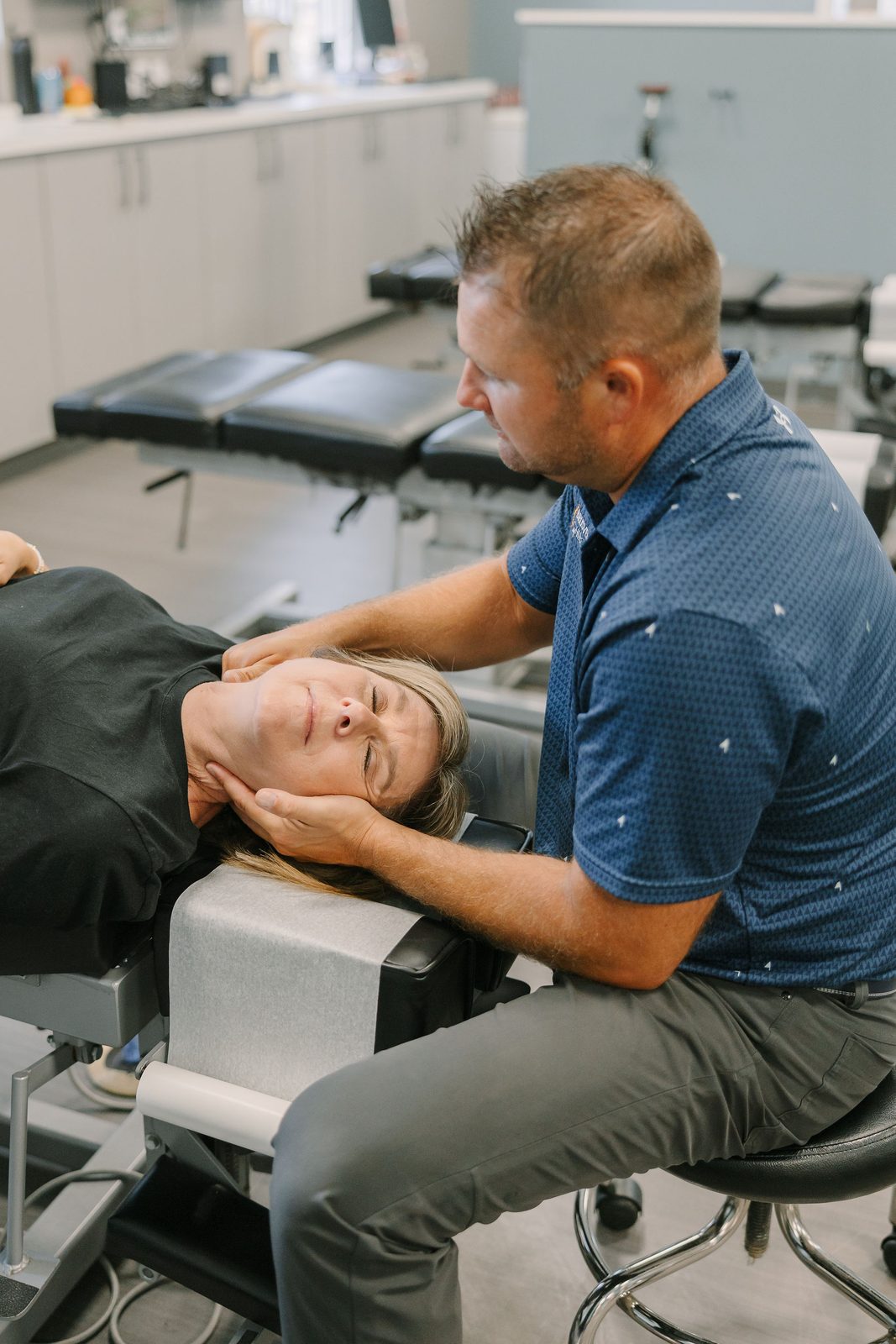 Gentle cervical adjustment for whiplash recovery